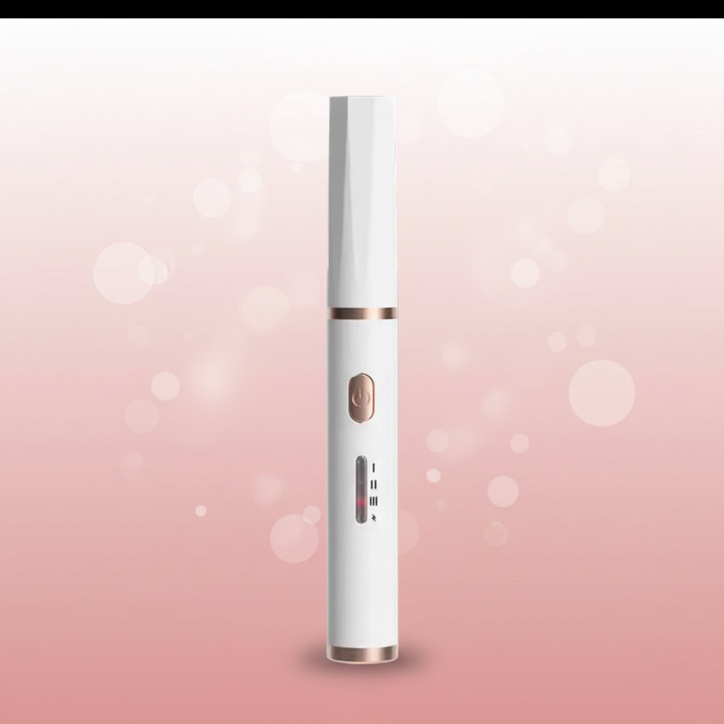 Portable heated eyelash curler